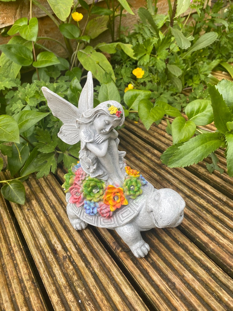 Solar-powered fairy and turtle decorative lamp sculpture